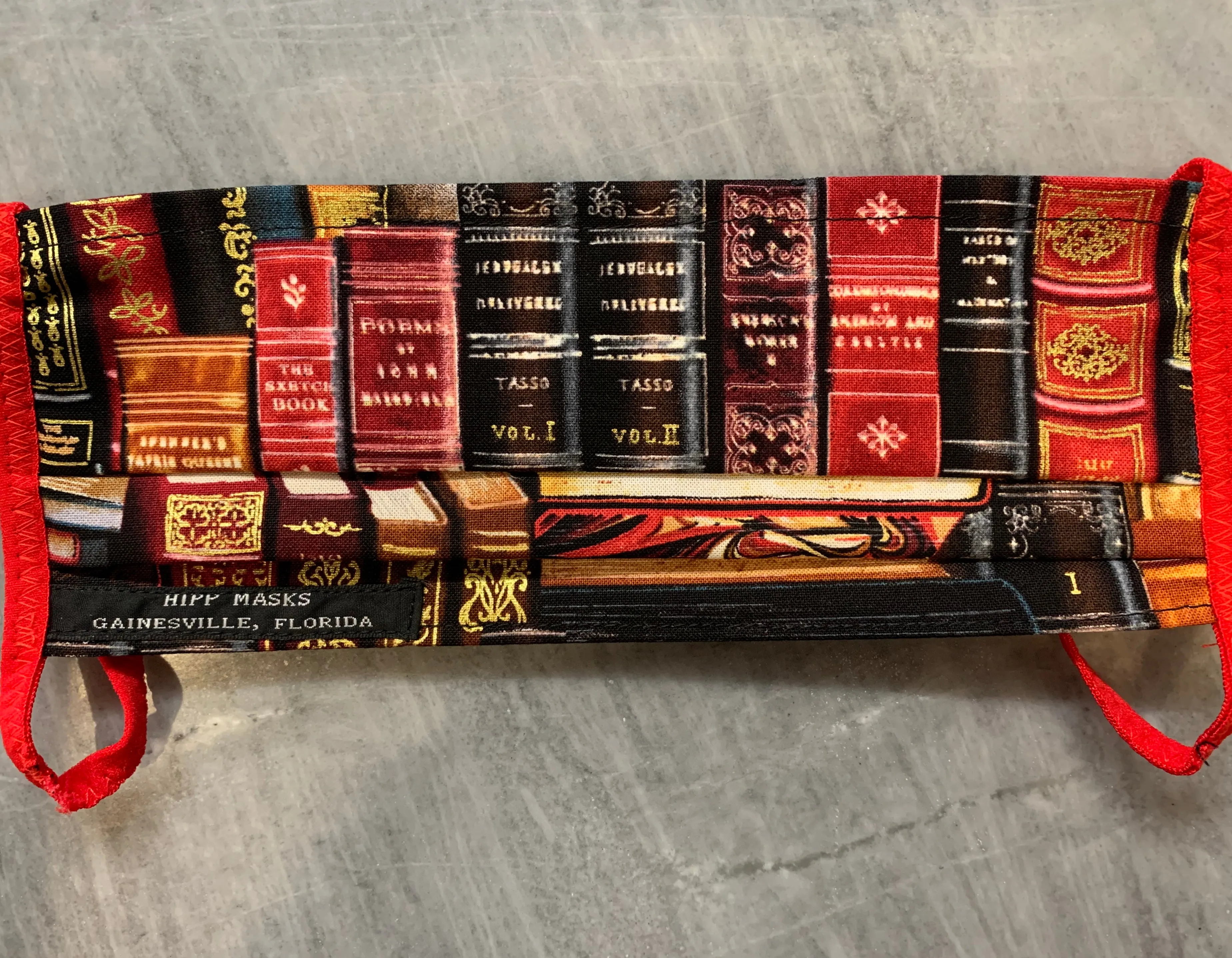 Alachua County Library District:  Gold Embellished Book Stacks with Red or Black Foldover Elastic for Ears