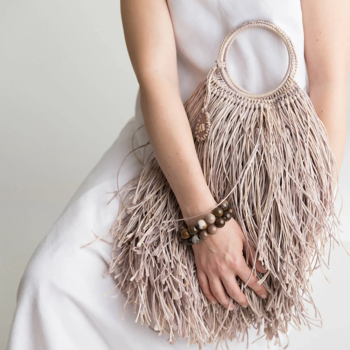 IVY IN NATURAL FRINGE BAG