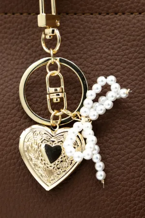 Small Pearl Bow Heart Purse Charm in Gold | NCA067-GDCRM
